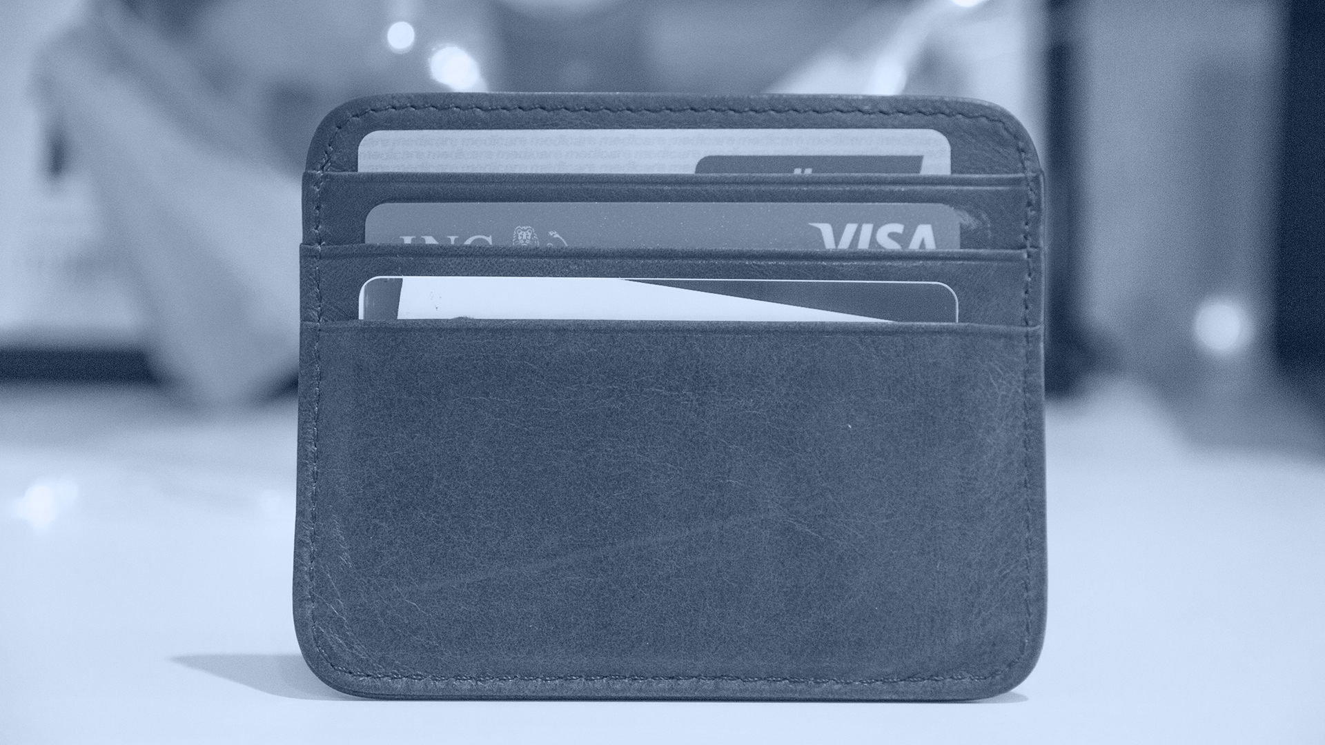 A wallet with three full cardholder slots